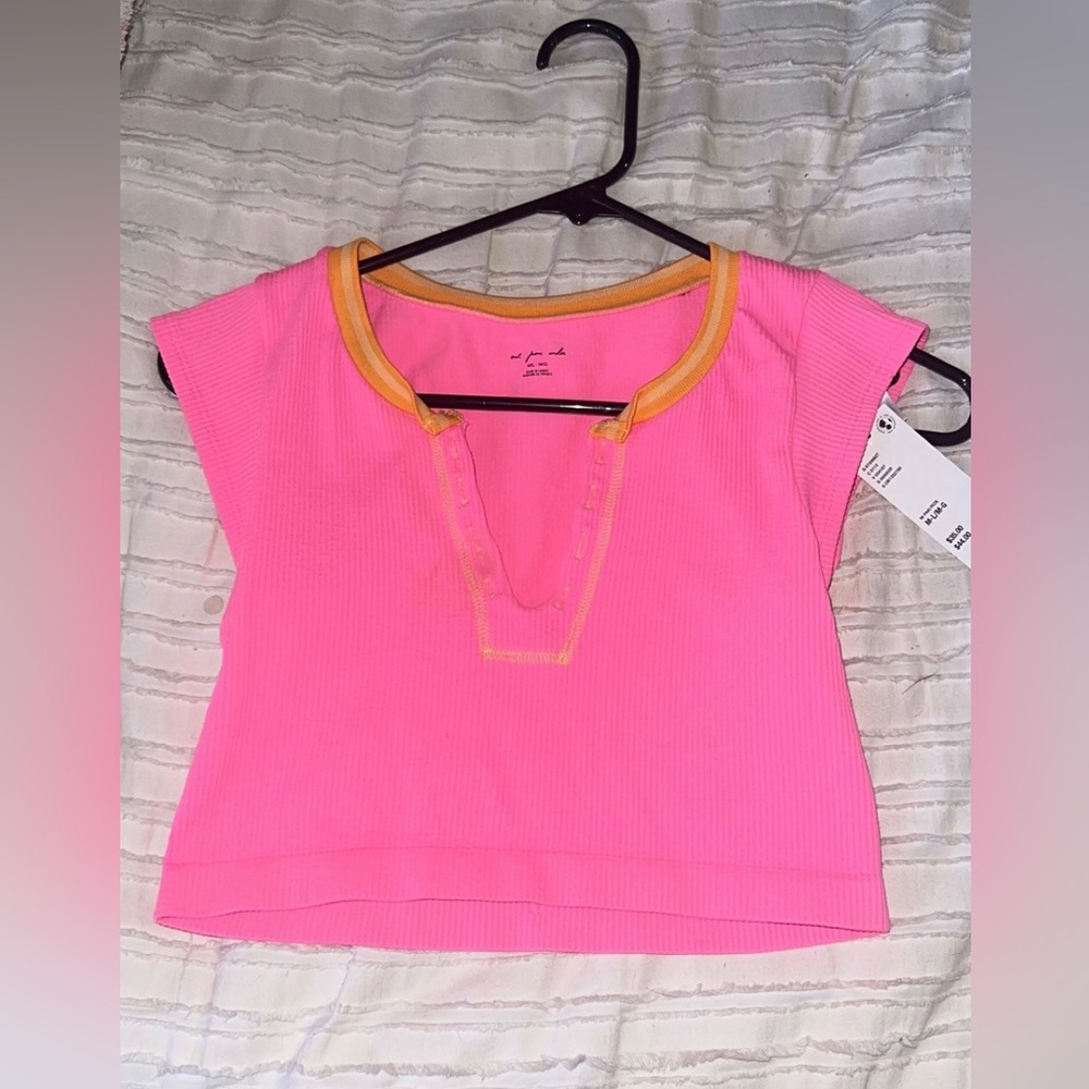 pink and orange urban outfitters go for gold top